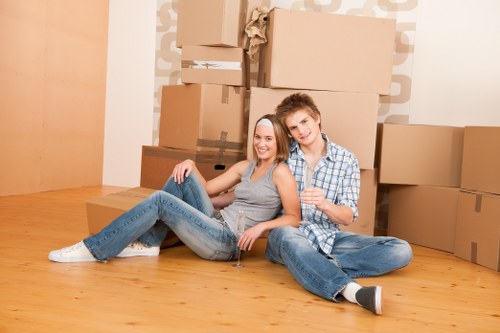 Staff using protective equipment during a house move