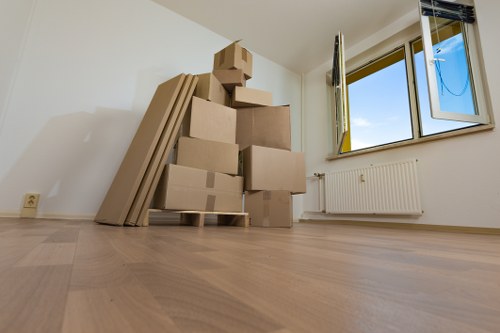 Packed boxes and furniture loaded for removal truck hire