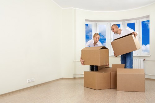 Professional movers unloading items at a Westealing property
