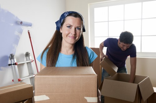 Careful furniture handling during a man with van removal in Westealing