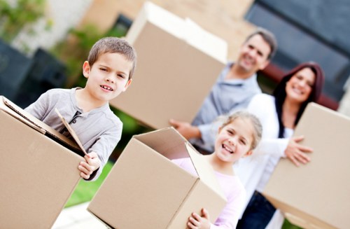 Packed moving boxes and furniture for a local removal service