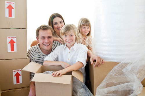 Loading furniture and boxes into a removal van for a Westealing customer