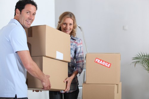 Local moving van helping with furniture transport in Westealing