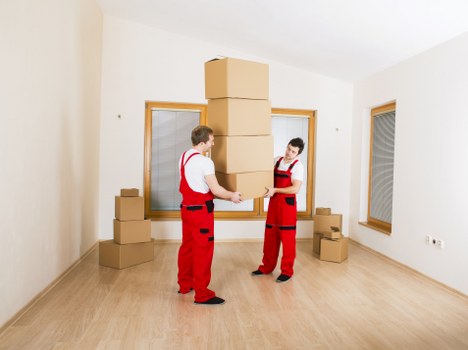 Removal crew carrying out a careful property protection check