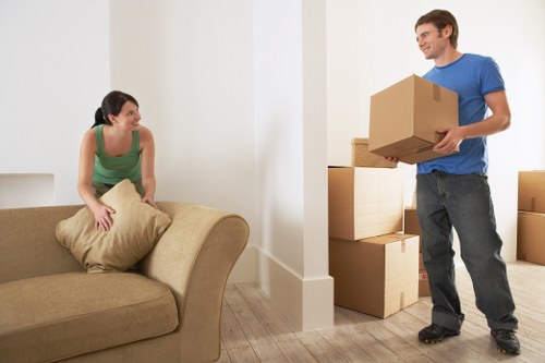 Moving van and team preparing for a property relocation in Westealing